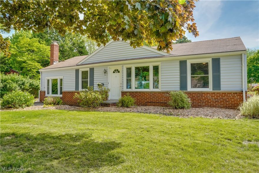 Do not miss this Beautiful, move-in-ready, home on half an acre in the heart of Mentor.  This open concept 3 bedroom 2 bathroom home boasts a recently renovated kitchen featuring Quartz countertops and custom, soft-close cabinets. The kitchen also has newer stainless-steel appliances that stay with the house. Both full bathrooms have been recently renovated. Hardwood floors span the entire house and there is a sun room that over looks the half acre property that is a quarter mile walk from the private entrance of the beautiful Veteran's park. On the outside the home also adds a 2 car detached garage, shed, and spacious backyard.