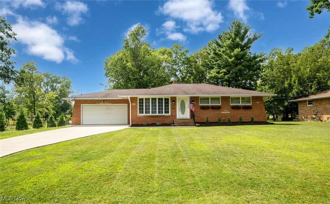 Welcome to this charming solid brick ranch in Briarwood Estates! This well-maintained home offers spacious living areas, a gorgeous lot, and a great location!
The heart of this home showcases a renovated kitchen featuring radiant heated floors, a center eat-in island, double ovens (including convection), and two pantries! The kitchen flows seamlessly into the dining room and living room, where a large bow window floods the space with natural light. Throughout the first floor, hardwood flooring lies beneath the current carpeting, ready to be unveiled for those who prefer classic wood.
Three bedrooms feature California closet organizers, ensuring every item has its perfect place. Both bathrooms have been tastefully renovated to meet modern standards while maintaining the home's character. Downstairs you'll find a huge, finished basement, complete with a ventless gas fireplace that creates the perfect atmosphere for relaxation or entertaining. Add the final touch with new flooring of your choice. This lower level effectively doubles your living space with ample room for recreation and functional utility and storage space. A convenient second shower is located in the laundry room. Step outside to discover your own private oasis featuring an expansive maintenance-free Trex deck where you can host gatherings or simply unwind. The included hot tub adds a touch of luxury, while the natural gas grill ensures you are always ready for outdoor cooking adventures. The big private backyard provides the perfect place for fun, parties, gardening, or relaxation. A newer driveway leads to an attached two car garage. This home combines comfort, convenience, and character in a package that is ready for new owners to call it home. Conveniently located close to shopping, restaurants, highways and the highly rated Brecksville- Broadview Heights school district. Don't miss!