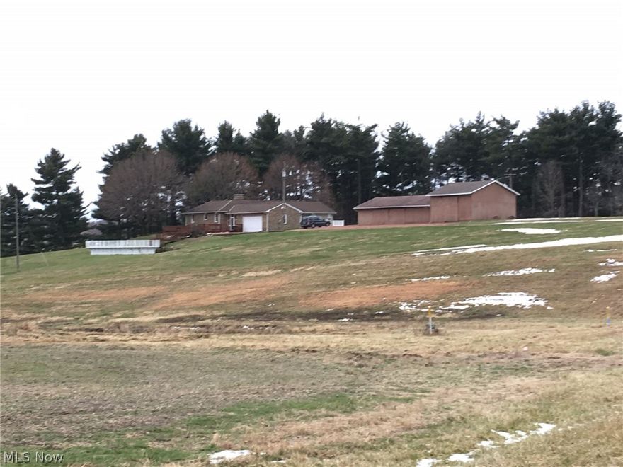 * Spacious brick ranch on 5.7 acres with 4000 sq. ft. of living space! 
* Main living space, with the additional living space, includes 2 full kitchens, 4 full bathrooms, 6 bedrooms (6th bedroom can be used as an office or   
        living room)
* Gorgeous deck connects the home to the pool!
* Flooring ranges from brand new carpet to beautiful wood to ceramic tile. 
* The barn is plenty big enough for camper, motor sports vehicles, tractors, tools, and more!  Can also be converted to a livestock barn. 
* A continuous floor plan upstairs and additional space downstairs result in so much potential!
* Balcony off the master bedroom for scenic “bed and breakfast” view!
*      New 1 HP well pump in 11/15