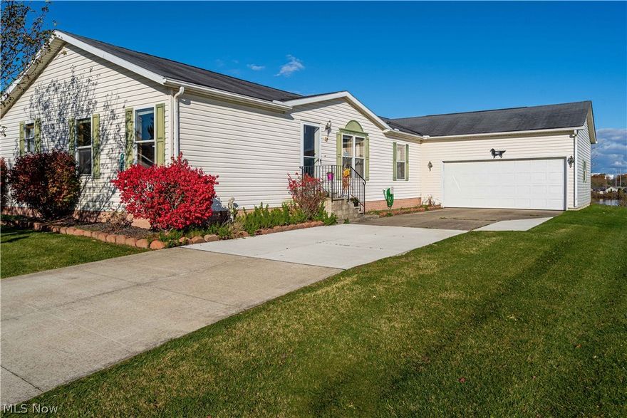 One of the largest homes with the best view in Lakeside Terrace.  This 3 bedroom, 2 full bath homes needs some TLC and is being sold as-is but has huge potential. There is a 2 car attached garage, multiple areas for entertaining and a deck over looking the water.  Appliances are negotiable.  Buyer must fill out application with Lakeside Terrace office.  Summer pool pass is $5, "The Cove" Community facility has free rental to all residents.