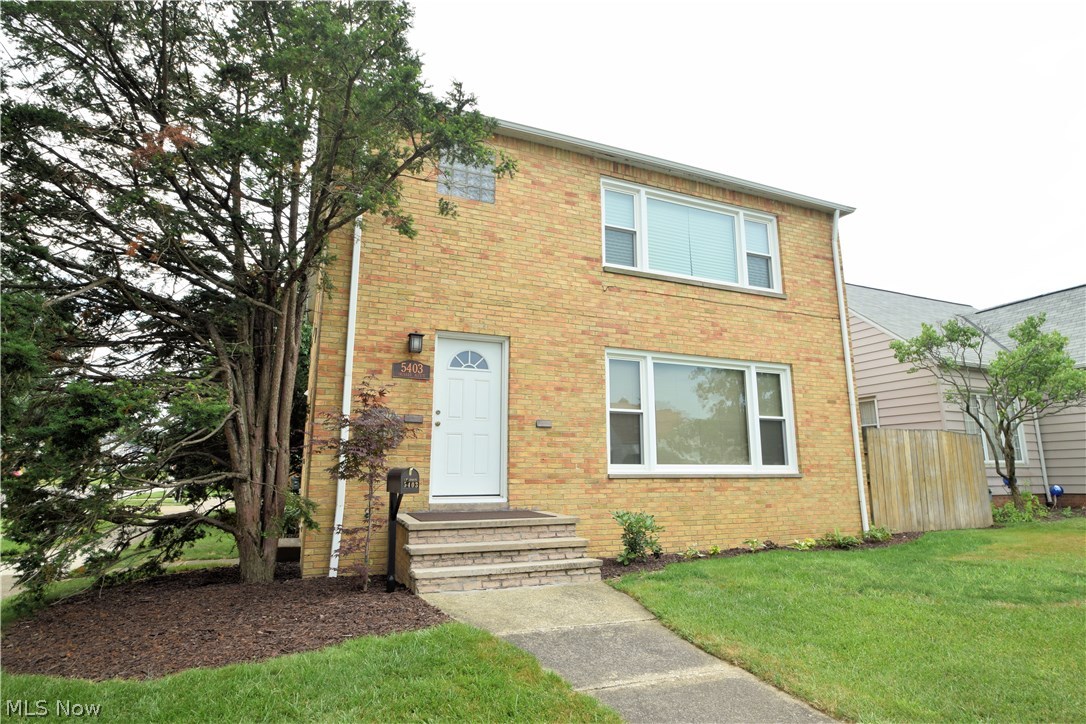 Brick double with 2-car garage. Both units have 3 bedrooms, full bath, eat-in kitchen with appliances, and 1-car garage access. Half basement for each unit. Beautiful hardwood floors. All NEW windows. First floor unit has remodeled kitchen and bath. Great investment!