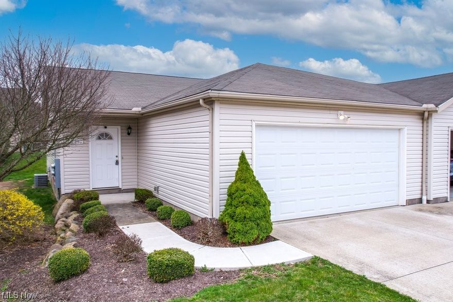 Welcome to this two Bedroom, two Bathroom carefree ranch condo in Waterford Pointe of Pleasant Lakes! Great opportunity as an investment, starter home, or a maintenance free downsizer, this end unit condo has an open floorplan with vaulted ceilings, luxury vinyl plank flooring, fully applianced kitchen with counter seating, and a large great room with dining room area and sliders to a patio. The primary bedroom features both an en suite bath and walk-in closet. The second bedroom has a double closet and direct access to another full bath that includes the washer and dryer (included in the sale). An attached 2 car garage provides additional storage. Just minutes from Kent State University, NEOMED, I76, and downtown Kent. This lovely home is sure to please! Come see today!