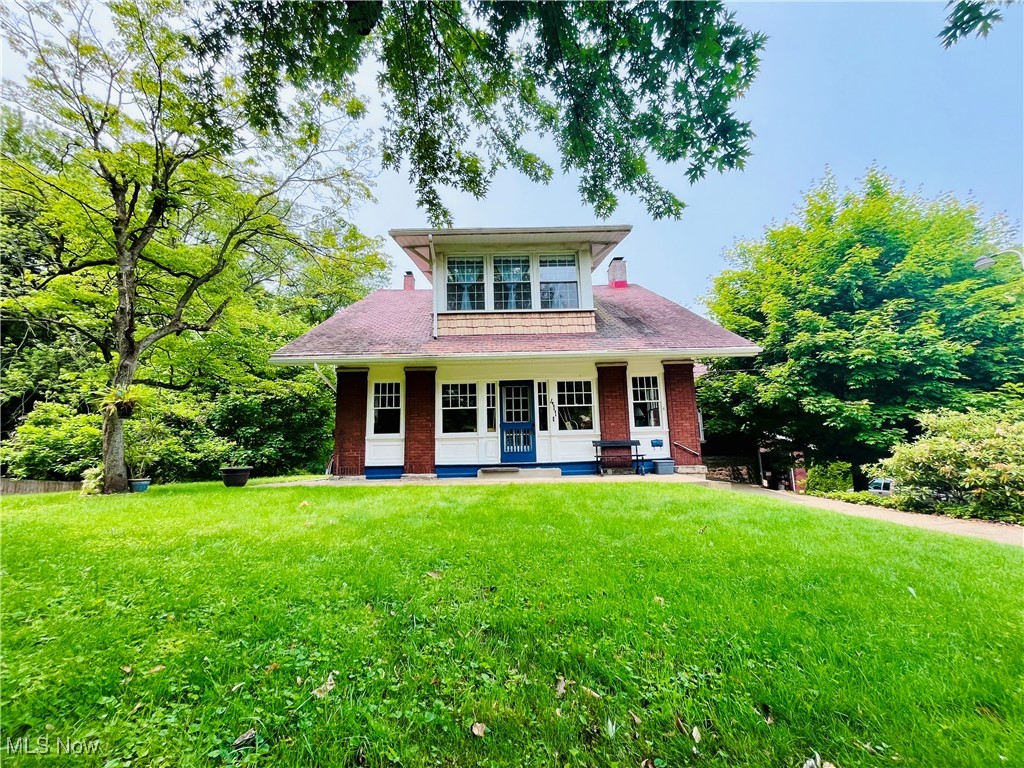 This charming home in a quiet neighborhood situated on over half an acre in city limits has so much to offer! Through the front door, you step into a beautifully enclosed sun room, that leads into the entry and living room of the home. This large living room boasts a grand fireplace and plenty of space to entertain. The dining room offers more than enough space for your family to enjoy together. The master bedroom is located on the first floor and contains a large walk in closet, in addition to a full master bath. Upstairs there are three graciously sized bedrooms and a large bathroom, with a beautifully kept stand alone, claw foot tub. Outside is your own private oasis, from the back patio, you descend a stone staircase into the backyard. With an attached single car garage and a large 2 car detached garage, the possibilities are endless for workshops and storage. This property contains many opportunities for your family to feel right at home. Call today for your tour!
