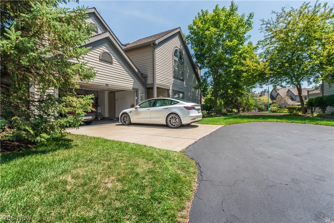 Welcome to 341 North Bayshore! This beautiful condo provides over 2,000 square feet with full first floor living and tons of additional space upstairs! The main floor offers the much desired open concept floor plan! Enjoy your spacious kitchen as you overlook the living room and views of the remarkable gas fireplace focal point! Off the living room you'll note glass doors leading to your patio featuring a stamped concrete pad and gas line hookup! The large primary has its own walk-in closet and full bathroom. You'll also appreciate the convenience of first floor laundry and an additional half bath on the main floor! Upstairs features a large loft area equipped with a wet bar as well as 2 additional bedrooms and additional full bath. You won't want for more storage with multiple walk-in closets, a pantry, utility room, plus an additional large storage closet upstairs. The spacious 2 car garage is equipped with hot and cold water spigots as well as a 14-50 electrical which can be used fo
