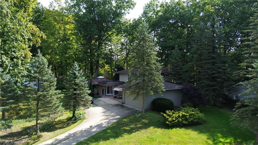 Discover this charming home located in Chagrin Falls offering a blend of comfort and style. This residence features spacious living areas, a modern kitchen, and ample natural light throughout. Exterior includes a landscaped yard, appropriate for outdoor enjoyment. Conveniently situated near local amenities, this property provides a peaceful retreat with easy access to the vibrant community of Chagrin Falls. Don't miss the opportunity to make this house your home!