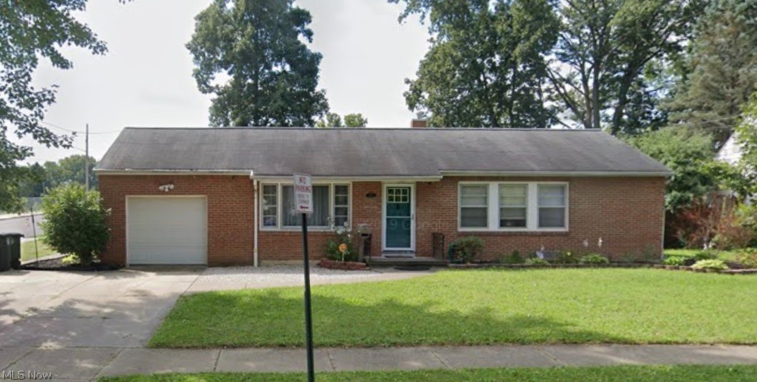 Welcome home to this beautiful brick ranch! Enjoy the updated kitchen with tall, 'soft close' cabinets and butcher block countertops. Hardwood floors throughout the main level. 3 bedrooms and 2 full baths. The basement has been partially finished as a rec room and partially laundry area and storage. Fabulous yard that is enclosed by an attractive 6ft white vinyl privacy fence. Enjoy the covered patio, along with the water feature and landscaping.