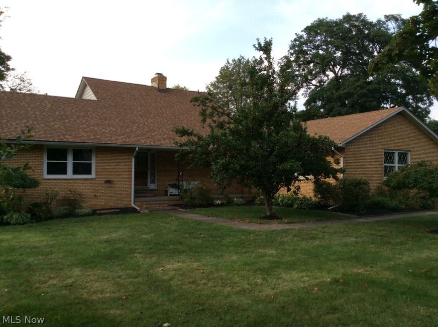 Welcome to this beautiful well built large brick home that sits on over a half acre lot with wooded views and privacy in the backyard. This home features 4 bedrooms, 2.5 baths, and 2 garages-one is attached and the other detached. Outside you will find a concrete patio with a built in gas BBQ, a heated above ground swimming pool, a storage shed, a covered front porch and apple trees. Inside there are beautiful hardwood floors, updated kitchen with granite countertops, a floor plan that interior designers would love because of all the different ways it could be decorated. You'll also notice that there are lots of windows allowing tons of natural sunlight to shine through making it a warm and inviting atmosphere. The house has many great features including a walk in attic for storage plus pull down stairs to another floored attic, a walkout basement with a kitchen and fireplace, pocket doors for privacy if so desired and a 2 story foyer with double closets. There have also been many updates to the house as well. Those are a brand new roof put on 2 weeks ago on the house and storage shed, Pella storm doors, triple pane windows, high efficiency furnace, pool heater and pump, brand new electrical box, new refrigerator, dishwasher, dryer and washing machine. Just move right in and make it your own. Located close to Riverside High School and Route 90 making it convenient to get anywhere. This house will not last at this price so make your appointment today! Home warranty included.