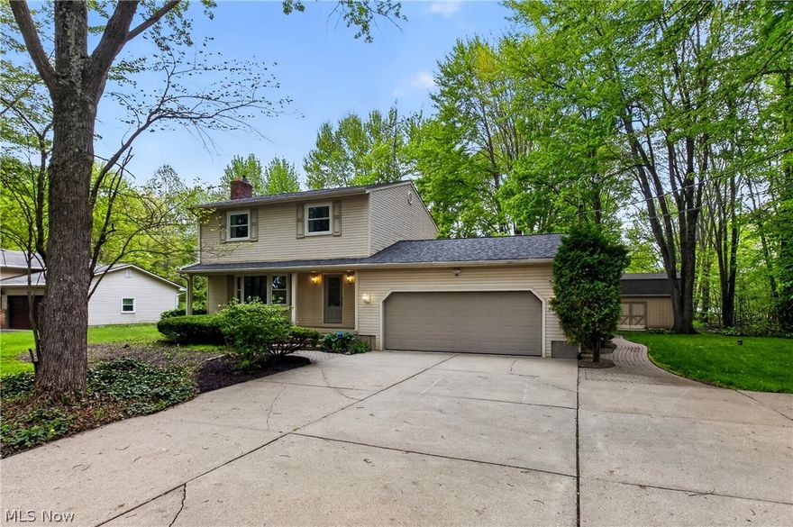A spacious and functional layout featuring 4 bedrooms and 2.5 baths, including a private primary suite with its own full bath. The home offers a welcoming living area with fireplace, while the kitchen comes complete with appliances staying. A standout vaulted ceiling sunroom with its own fireplace overlooks the backyard and opens directly onto the rear porch, creating an ideal space for relaxing or entertaining. Additional highlights include a large insulated two-car garage with dedicated workshop/woodworking space, separate storage shed, whole-home generator, and major updates including the roof, furnace, and hot water tank all approximately 1 year old. The lower level adds even more living flexibility with an additional bedroom and usable bonus space. Seller is also offering a home warranty for added buyer peace of mind. Plenty of functional indoor and outdoor space throughout this well-maintained home.