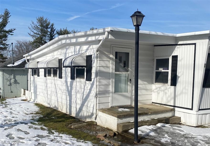 Welcome to this charming two-bedroom, one-bath mobile home, perfectly situated on a corner lot in beautiful Kirtland, Ohio! With a little TLC and some fresh paint, this home is ready for you to make it shine. The kitchen is a highlight, boasting ample cabinet space for all your culinary needs. An addition provides extra living space, perfect for relaxing or entertaining. This affordable home offers a fantastic opportunity to own a property in a desirable location. Schedule a showing today and make this house your home!