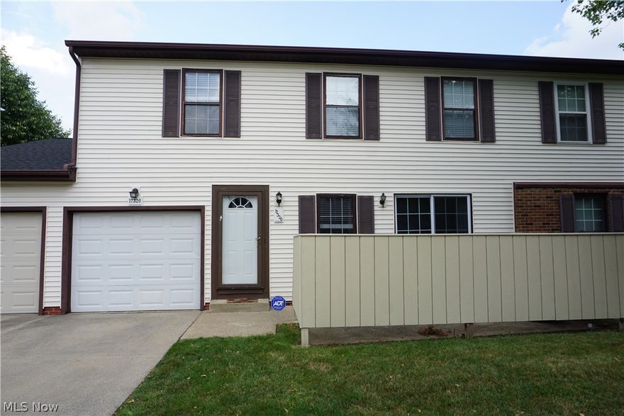 Welcome to this completely updated 3 bedroom, 1.5 bath townhouse with over 1500 livable square feet, private outdoor patio and 1 car attached garage.  The eat-in kitchen features stunning white cabinets, porcelain tile backsplash and granite countertops.  Living room and updated half bath complete the main floor.  Upstairs hosts 3 bedrooms and updated full bath with tile flooring.  The lower level features a large rec room, laundry room and additional living space.  Laminate flooring throughout as well as all new light fixtures.  Other updates include new hot water tank, electric panel and new patio fence.  This townhouse is conveniently located minutes from the interstate, close to downtown Cleveland, the airport, shopping and parks.  Schedule your private showing today!
