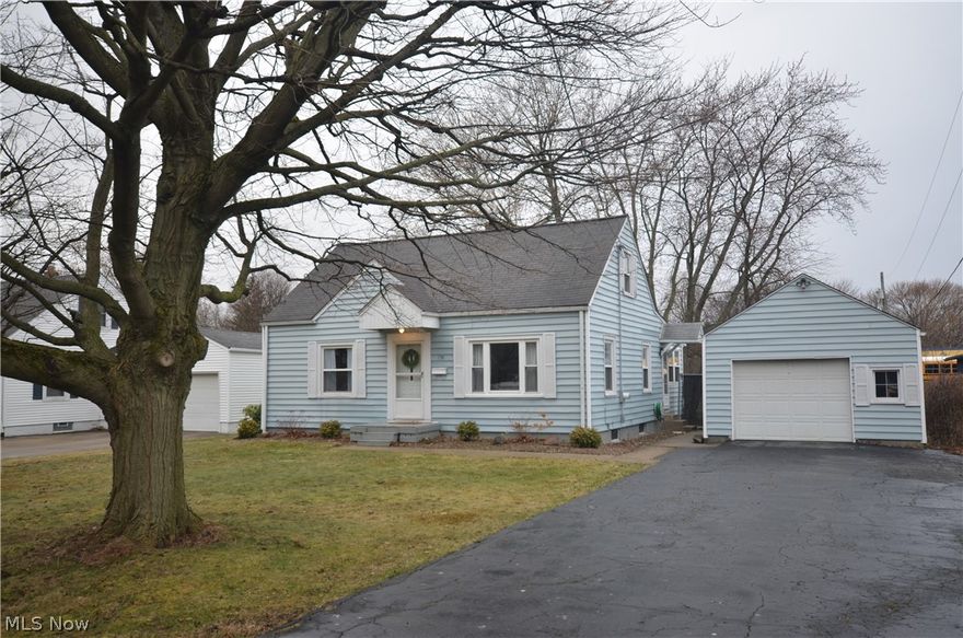 Tallmadge 3 bd 1 bth at the end of a dead end street! This opportunity includes a 1.5 car garage w blacktop driveway and a nice back yard. Rare addition on the back of the home adds square footage and provides a fantastic dining area that most of these homes lack! Nicely updated paint, flooring, fixtures, bath and ready to move in! Living rm w hardwood floors leads to the updated kitchen and eating area with access to the addition at the back of the home for a great dining rm, play room, office or craft/hobby space. Two first floor bedrooms plus a bedroom upstairs with fantastic built in storage & brand new carpet. Completely updated 1st floor full bath w all of the modern finishes. Full basement for great storage space and laundry hook up.  Vinyl siding, roof, furnace and HW tank all believed to be less than 15 yrs old. Updates in 2020: Bath (tile floor, vanity, shiplap, commode, plumbing), Paint throughout, Light Fixtures, Ceiling Fans, Carpet (Upstairs), Expose Hardwood, Electric pa