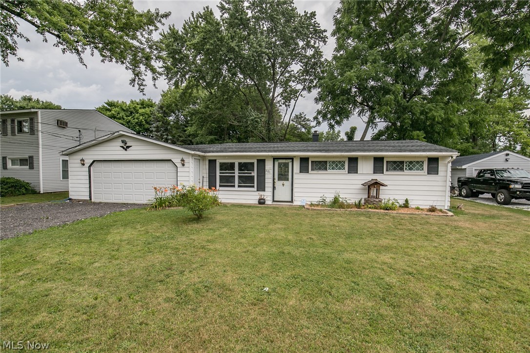 A wonderful Ranch with an open concept. This lovely home has a large family room with a fireplace, that opens to a sun room. The updated kitchen will include all of the appliances, and is open to the living room, which can also be used as a dining room. The bedrooms are spacious. There is an attached, and heated, 2 car garage, large lot, deck, and so much more. This home is freshly painted and move in ready.