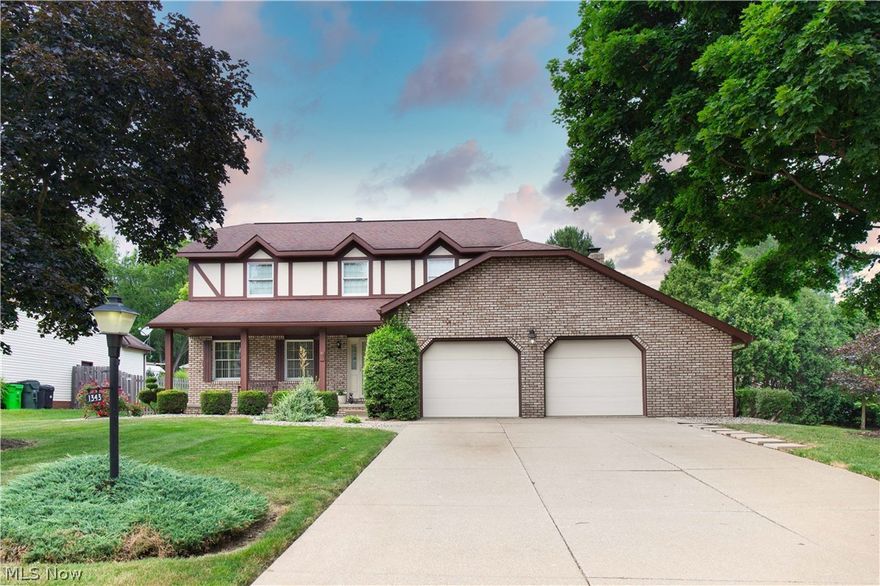 Spacious, beautifully maintained home nestled in a quiet North Canton neighborhood! Custom built with oak woodwork and Corian countertops, this home will not disappoint. Stepping inside, you are greeted by authentic hardwood flooring leading to a large kitchen with brand new appliances. Off the kitchen is an entertainment room featuring a fireplace and a sliding door leading to an outdoor patio with scenic backyard views! First floor laundry features a new washer and dryer. Also on the main level is a separate dining room and living room. Upstairs are four bedrooms and two full bathrooms with plenty of space! The master suite features a separate full bathroom with marble flooring and a walk-in closet. A built in laundry chute from the master suite to the laundry room makes keeping clean a breeze. Stepping back downstairs to the partially finished basement, there is truly room for everyone. Outside is meticulous, low-maintenance landscaping and a back yard perfect for hosting guests. Th