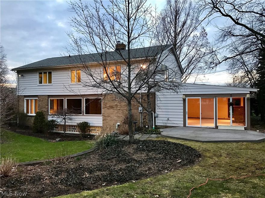 MID CENTURY MODERN WITH OVER 3400 SQ FT OF LIVING SPACE!!  This amazing mid century modern home boasts 4 bedrooms, 3 full bathrooms, and is situated on almost 1/2 acre lot of fantastic landscaping. The crisp and sun  filled first floor boasts a 28x19 family room with floor to ceiling windows and a fireplace which is directly off of the kitchen. in addition to an expansive living room , dining room and kitchen there is a beautiful library/ study with built in book shelves. An added bonus  is a beautiful refrigerated wine cellar off of the workshop in the lower level which is perfect for a wine connoisseur .The current owners have spent over $290,000 improving and updating this home over the years and the quality of craftsmanship and care that have been invested into this special home is apparent in every room. Just steps to the Belvoir Circle RTA stop and conveniently located close to University Circle.