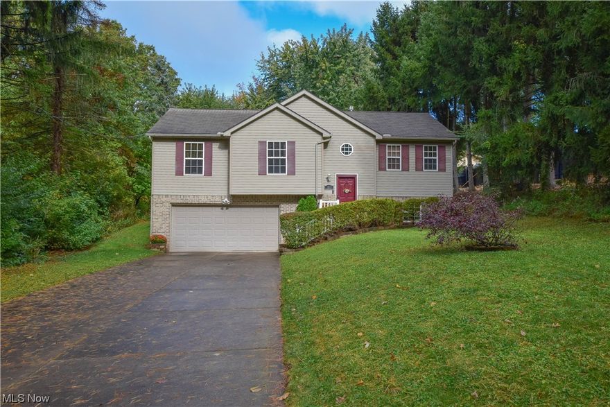 Welcome to your dream family home! Nestled within the sought-after Green Local School District, this immaculate bi-level residence boasts an array of impressive features and provides a comfortable and spacious environment for you and your loved ones. Step inside and be greeted by the welcoming bright and airy living room, adorned with a large window, creates an inviting space for relaxation, and an easy flow to the eat-in kitchen, where there is ample cabinet space. Off of the dining area is easy access to the deck, where you can enjoy the spacious backyard. All 3 bedrooms can be found on the main level, including the master bedroom retreat, complete with beautiful ensuite bathroom and convenient walk-in closet! Two additional generously sized bedrooms on the opposite side of the home ensure plenty of room for your growing family or guests. The convenience of a laundry area on the main level simplifies your daily routines. The lower level offers a finished recreational room offers endless possibilities, whether it's a cozy spot for movie nights, a game room, or even a home office. With direct access to the garage, it's incredibly convenient for daily living. Don't miss the chance to make this wonderful bi-level home your own. Contact us today to schedule a private showing today!