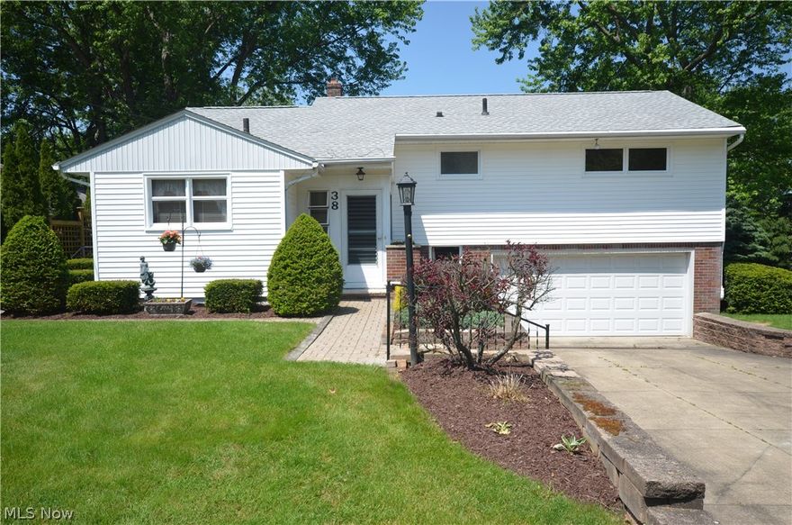 Tallmadge opportunity- absolute move in condition on fantastic private lot- spacious shed & covered patio ready for your own porch swing! Great open layout from living space w tons of natural daylight from abundant windows- flows into the kitchen w freshly painted (inside and out) cabinets, updated counter- plus a tile backsplash pantry cabinet & all appliances stay! LED light fixtures brighten the space. Hardwood floors upstairs flow down the hall into spacious bedrooms. Recessed area great for dressers or desks in two of the bedrooms. Master bedroom is a very nice size and offers 2 closets. All closets have lights as well! Spacious hall linen storage w cabinet & drawers…very deep! Spacious full bth includes a large vanity w drawers, tons of built in storage, shower/tub w tile surround and new (’16) flooring! Spacious 2 car garage with TONS of outlets, H/C water, opener, keypad, workbench, built in storage & drain. Lower level offers laundry area w utility sink to drain washer, commod