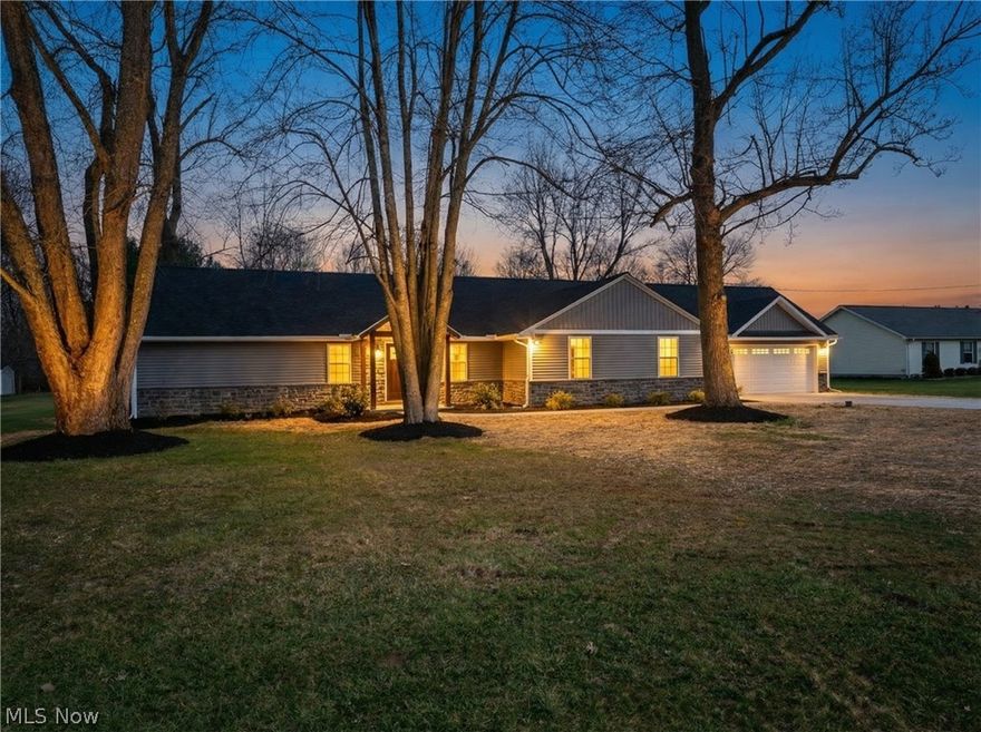 Fully rebuilt in 2026, this like new ranch in Burton Township offers over 2000 square feet on a private one acre lot in the highly desirable Berkshire School District, just minutes from Route 422 and a convenient drive to Cleveland. This move in ready home combines modern design, open concept living, and peaceful outdoor space, making it a rare find in Northeast Ohio.

Reconstructed from the studs with over 90 percent of the home completely new, this property delivers true like new construction feel with updated systems and finishes throughout. The bright open layout features natural light, modern flooring, updated fixtures, and a seamless flow between living spaces.

The kitchen is the centerpiece of the home with quartz countertops, soft close cabinetry, brand new stainless steel appliances, and a large island perfect for everyday use and entertaining. The open floor plan connects the kitchen, dining, and living areas for a functional and inviting space.

The primary suite offers a private retreat with a custom tile shower, double vanity, and modern finishes. Additional bedrooms are spacious and share a fully updated second bathroom. A sun filled bonus living space surrounded by windows adds flexibility for a family room, office, or lounge area.

Outside, the full one acre lot provides space, privacy, and endless potential for outdoor living. The patio creates a natural extension of the home for relaxing or entertaining.

Additional features include a 2.5 car garage, dedicated laundry area, slab construction for low maintenance living, no HOA, and low taxes. Located near Lucia’s Mash, Fidon Russell Park, and Burton Wetlands Nature Preserve, this home offers both lifestyle and convenience. Move in ready and built to impress.