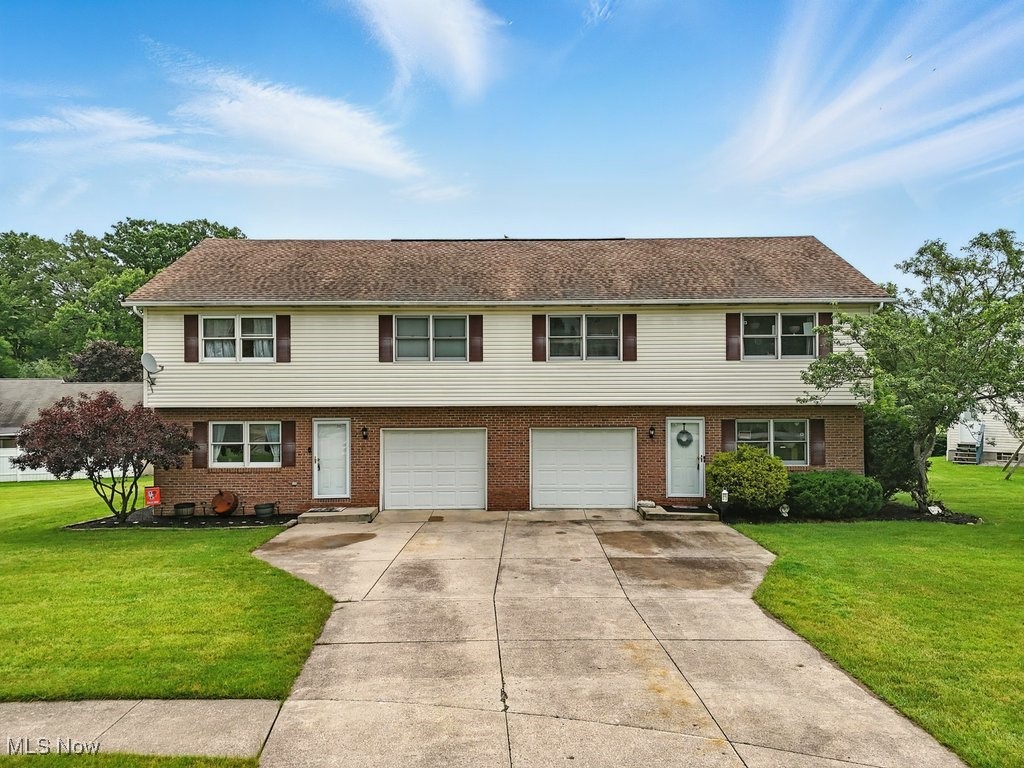 Spacious raised ranch duplex situated on a quiet cul-de-sac near several amenities in Tallmadge schools. For each unit, enter into the lower level family room which offers access to the laundry/mechanical room, attached garage, half bath, and rear deck. Head upstairs to the main level featuring an open living room, large eat-in kitchen, two generously-sized bedrooms, and a full bath. Arborvitaes separate the decks, providing a private backyard retreat for both units. The oversized driveway and cul-de-sac offer ample space for parking. Roof 2012 + newer HVAC/water heaters. Turn-key and larger than other multi-family properties in the area, this rare find is a great opportunity for investors or the owner occupant who wants to live in one side and have the other side contribute to their living expenses. Fully-occupied (month-to-month tenants) - 24 hour notice required for showings.
