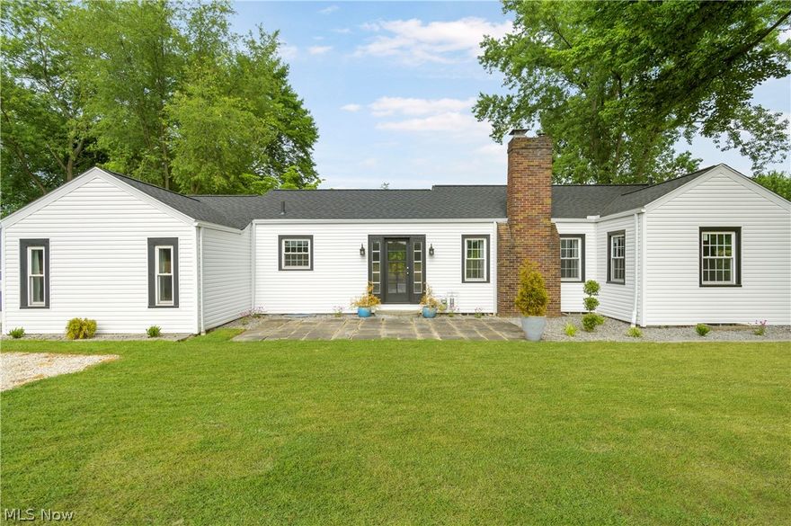 This charming Ranch home Sits in a secluded setting on a beautiful two-acre lot in Jackson Township. This lovely home is well-maintained, freshly painted, bright, and airy, with lots of character, mature trees, and privacy on a dead-end street—wood floors throughout living areas and bedrooms. The beautiful great room has a wood-burning fireplace, a large bay window with great backyard views, and access to the large covered back porch. The eat-in kitchen offers windows on both sides, white cabinets, a stainless stove & refrigerator, and is open to the dining area. The main floor is complete with three bedrooms (one has an access door to a fence-in side yard, perfect for pets), two full baths (with a walk-in shower), and a mudroom. Enjoy your summer in the two stone Patios and a fire pit for ultimate sunset views and entertainment. Full basement with a bath (#2), a laundry room, glass block windows, built-in shelve, and storage space. A Detached Two Car Garage. Great location - nearby sh