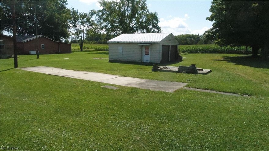 Welcome to 4505 Doylestown rd. The picturesque property boasts a 2 car garage, public water, septic, a pre-laid patio and a corn field behind you.