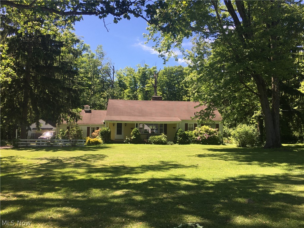 This home needs love...but it is an Amazing location. So much potential...or build a home of your dreams.