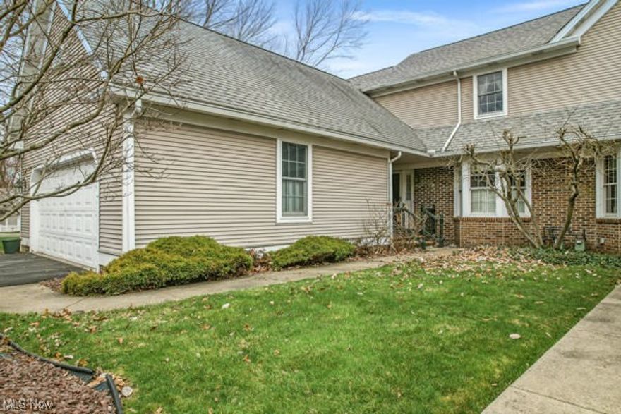 This beautiful Ledges condo is located in the heart of Poland, with 1,652 sq. ft. of comfortable, private living space and adjacent to  Yellow Duck Creek and the Poland library.  The living space includes a  large great room with vaulted ceiling, skylights, hardwood flooring, & a beautiful floor-to-ceiling gas fireplace. The fully-equipped kitchen has newer stainless appliances, ceramic flooring, a bay window with seating, and abundant cabinet & counter space. There is also a formal dining area in the great room, if needed. The first floor master suite includes a vaulted ceiling, walk-in closet, and a remodeled, private bath.  A large additional bedroom is located on the second floor with a cat walk overlooking the great room. Special features include a spiral staircase leading to a private loft on the second floor, a first floor laundry, an additional half bath on the first floor, and a large screened porch off of the great room. The finished basement offers additional living space with a 3rd full bath, giving you a full bath on each floor. Plus a 2 car garage with extra storage space. If you enjoy walking, this is an ideal location in Poland, and is close to shopping, parks, and the freeway. Units within The Ledges don't become available often, so hurry before it's gone.