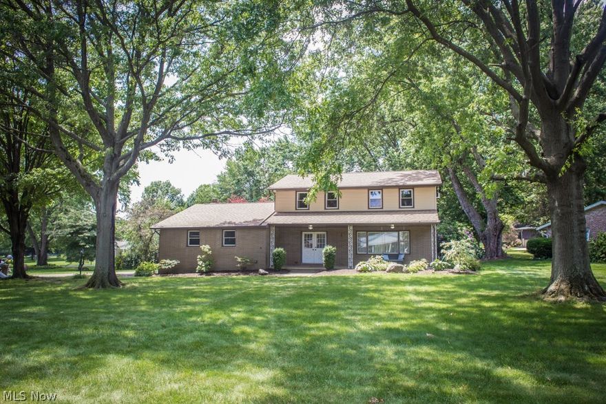 Welcome to this updated brick colonial 4 bedroom with 2 1/2 baths home in Jackson Twp.  Located in Jackson School district.  This home offers plenty of space indoors and out.  The open concept kitchen was fully updated with new appliances, solid maple cabinets, new countertops, oversized sink, and breakfast bar.  The open concept kitchen flows into the family room that has plenty of natural light with additional windows added.  You will also enjoy the installed gas log fireplace in the family room.  Newer carpet and flooring throughout the entire house.  New roof and siding in 2013.  Bring your guests to enjoy the deck and large yard.  Mature trees will provide the shade you need on hot summer days.  The home is conveniently located to The Strip, local restaurants, shopping and entertainment.  A home warranty has also been added.  This home won't last long so call and set up a showing now!