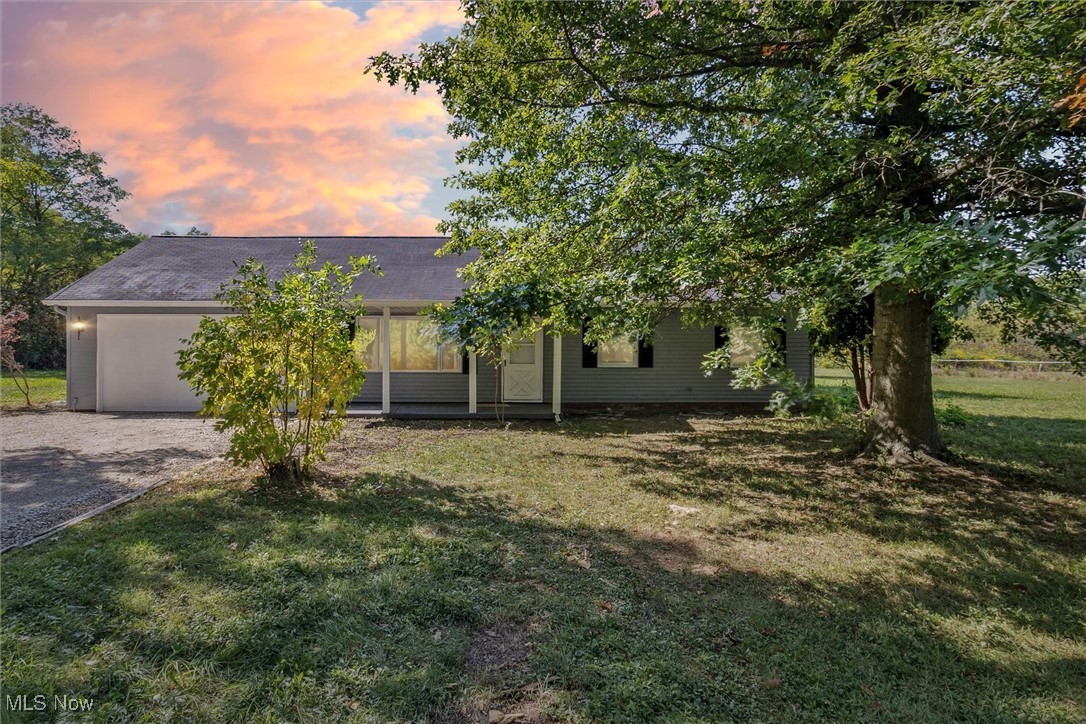 Welcome to this beautifully renovated ranch style home nestled on 3 private acres in Madison, Ohio. Featuring three bedrooms and two full bathrooms, this home offers comfort and modern updates throughout. Step inside to discover a freshly updated interior with thoughtful renovations that blend style and functionality. The layout creates a warm and inviting atmosphere, perfect for both daily living and entertaining. Outside, you’ll find a horse barn in the backyard, ideal for equestrian enthusiasts or anyone seeking extra storage and utility space. The expansive land provides room to roam, garden, or simply enjoy the peaceful surroundings. Additional highlights include a two-car garage, a newly refreshed exterior, and a location that offers true privacy while being conveniently situated next to the railroad. Whether you’re searching for a country retreat, hobby farm, or simply a move-in ready home with acreage, this property is the perfect fit.