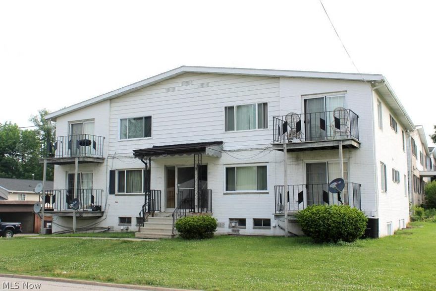 Investor Special! 6 unit apartment building for sale with separate utilities, garage parking for each, and newer windows. 3 bedroom units feature vaulted ceilings and private decks. Oven/range, refrigerator and washer/dryer furnished with each unit. Brick and aluminum sided exterior.  Landlord pays water/trash/sewer only.