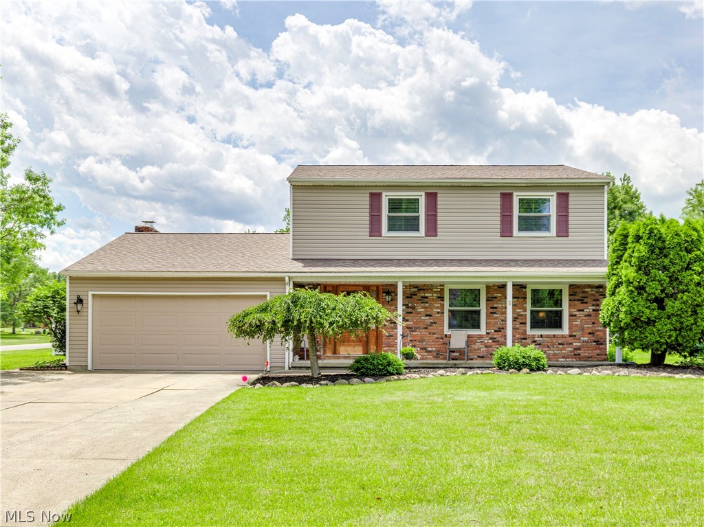 Call the moving company! Move-in-Ready, colonial home with great curb appeal is waiting on a new owner. This home features a neutral pallet, and new carpet, covered front porch and entry that welcomes you into the foyer. The formal living room is bright with an open feel to the formal dining room which is lovely for entertaining small to larger groups. Kitchen is complete with stainless appliances and the perfect amount of counter space and cabinetry. You will enjoy having morning coffee in the dining area that is open to the family room complete with wood burning fireplace and to sun room boasting high ceilings, skylights, slate floors and door to the outdoor patio area expanding your entertaining space even more. Master bedroom is private with dual closets and 3 additional bedrooms make for a perfect night’s rest. This home has a full basement simply waiting on your personal touches. Outdoors you will appreciate the 2-car attached garage, vinyl fenced back yard for privacy containing