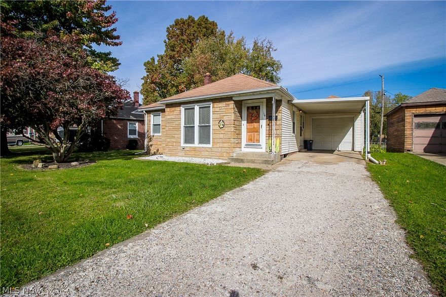 AFFORDABLE PERRY HEIGHTS RANCH! Step into the spacious living room with newer carpet plus room for a workspace! The galley style
kitchen leads to the dining room with ceiling fan and access to the backyard. The updated bathroom can be accessed from the main living
area as well as the bedroom hallway. The master bedroom features double closets and is tucked at the back of the home. Two additional
bedrooms are located near the front of the home. Additional living space is available in the lower level rec room with bar and knotty pine
walls and an additional toilet with vanity. The garage has a newer door, plus there's a carport that leads right into the kitchen! The backyard
is nice and level with a partial fence for privacy. Updates include roof 2001, windows 2002, electric panel 2004, electric outside 2013, carpet
2015 (Approximate dates) Conveniently located and in Perry Local Schools!