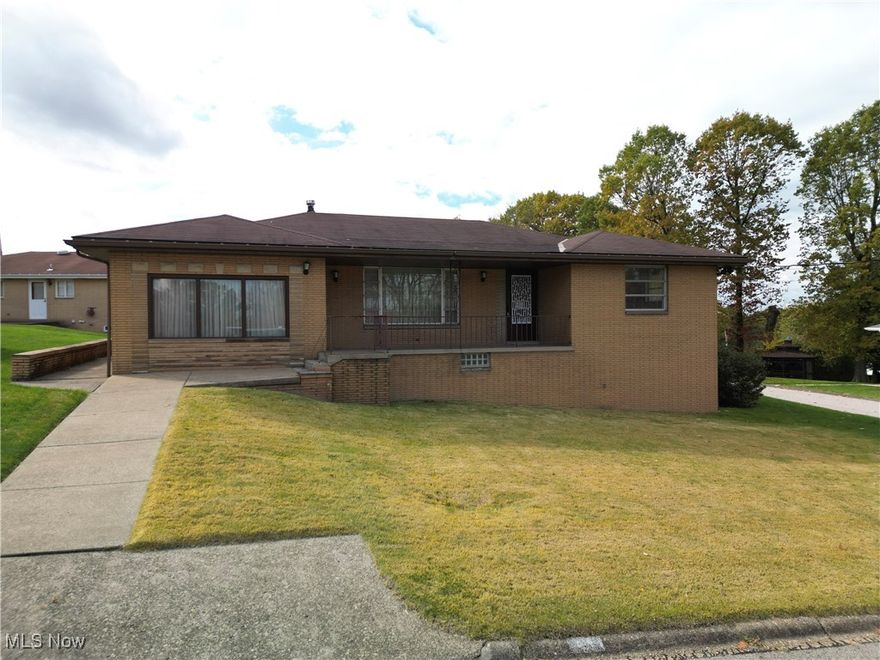 First time ever on the market!! Discover this well-maintained 3 bedroom, 2 bath, ranch home perfectly located on a corner lot and nestled in the charming neighborhood of Weirton Heights. This one-of-a-kind property offers an ideal blend of comfort, character, and convenience! Step inside to find a spacious living room with cozy fireplace, a formal dining room that opens to a large private patio-perfect for outdoor entertaining. You'll love the generously-sized family room that's ideal for gatherings. The kitchen comes well-equipped with a refrigerator, double-oven, and gas cooktop. The home boasts several updates with recessed lighting in the kitchen and dining room. Enjoy your morning coffee on the covered front porch, or host guests in the impressive walk-out basement complete with a second kitchen area, entertainment space with bar, and a second fireplace for added warmth and charm.  You'll appreciate the fruit cellar with storage shelving, ample storage areas, and a detached garage. Whether you're a first-time homebuyer, down-sizing, or seeking a change of scenery, this move-in ready, rare find home is ready to welcome you and make lasting memories! Conveniently located near schools, shopping, and dining.