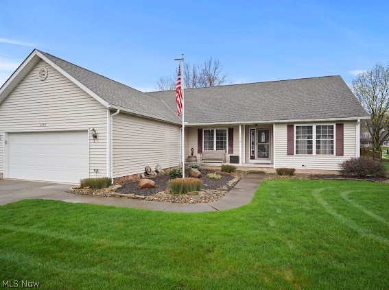 5713 Halwick Drive --- meticulously well-kept ranch located in Ravenna Township in the subdivision of Forest Ridge boosts 3 bedrooms and 2 full baths. Inviting front porch with stunning landscapes leads you into the foyer area with a coat closet and hardwood floors. Spacious living area with vaulted ceilings and a gas fireplace. Eat-in kitchen with granite countertops offer ample cabinet space + a pantry and all stainless steel appliances stay! The separate dinette area in addition to the eat-in kitchen is ideal for entertaining. The backyard features a newer deck with a gazebo + a partial fence & a storage shed., 2 bedrooms are located down the hall with a shared full updated bathroom with a quartz vanity. The owner's ensuite is very roomy with crown molding and the bathroom features dual sinks with granite countertops, a tiled shower and soaking tub and a walk-in closet. First floor laundry with storage cabinets, a utility sink with a granite countertop is right off of the 2-car attached garage. The garage has an epoxy sealed floor! The full sized basement has endless opportunity + a storage room and is even plumbed for an additional bathroom. The pool table stays! Ravenna Schools. Updates include: Roof/Gutter Guards (2017), HWT (2018), Bathroom Updates + Granite (2019). Neighborhood living, yet in close proximity to NeoMed, KSU, downtown Kent and Ravenna, shopping, restaurants and more! Don't let this opportunity pass you by!