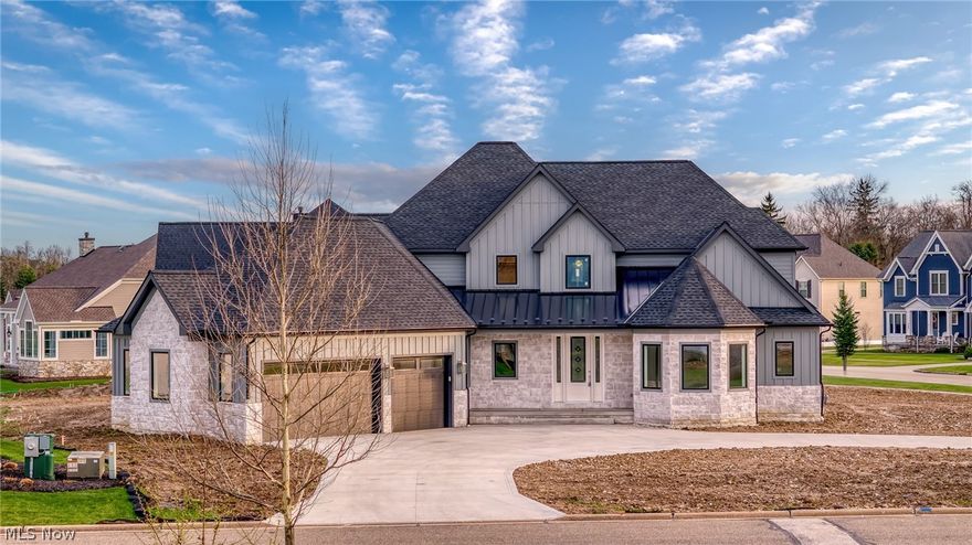 Modern luxury meets lakeside serenity in this MOVE-IN READY New Construction private sanctuary on the Lake at Barrington Estates. Why wait to build? 405 Club Dr is new construction, 100% complete, and ready for you today. Imagine waking up to breathtaking lake views in your brand-new morning room, then strolling over to the clubhouse for a round of golf. Experience the pinnacle of new construction with this custom-built masterpiece by Dommus Construction. Situated on a premier 3/4-acre corner lot within the prestigious Barrington Estates, this residence offers the rare trifecta of golf course living, captivating lakefront views, and immediate move-in availability. The interior is a masterclass in craftsmanship, featuring high end architectural details including a custom-stained, real wood floating staircase and solid core doors throughout. The gourmet kitchen is a chef's dream equipped with JennAir Professional grade appliances and custom Wellborn cabinetry with recessed door panels. Additional designer finishes include Anderson Tuftex rich Majestic Pecan hardwood floors, high-efficiency Pella windows framing the water views, and Durable James Hardie Board siding. Spanning nearly 4,000 square feet, the layout includes 5 spacious bedrooms, 4 baths, dedicated office, and a light-filled morning room designed for lakeside reflection. With front and rear porches, an optional finished basement, and expansive 3.5 car garage, this home is not just a residence—it’s a sanctuary. Every inch of this property exudes quality. Don’t miss your chance to own in one of the area’s most sought-after golf communities. Call the listing agent right away for a private tour today. Stop dreaming and start living. Schedule your private showing today to experience the Dommus difference.