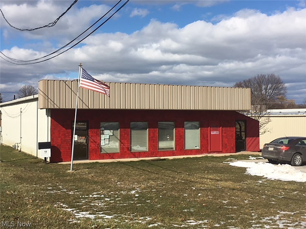 .798 acres with quality steel commercial building - City utilities - Offices and restrooms - Conference room - Several offices including large office or showroom - Rear roll-up door - Side 08x 30 sunroom