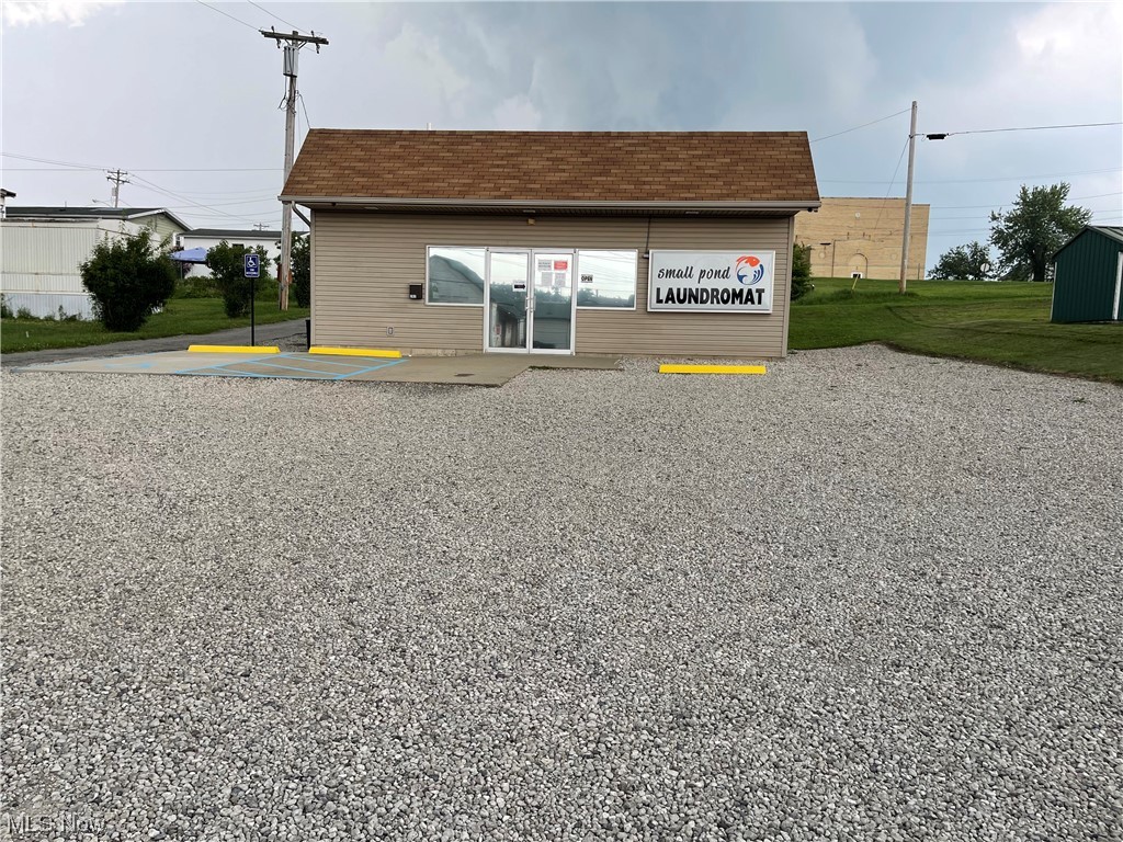 Woodsfield Laundromat for sale. The ONLY laundromat in the village. Buidling built in 2004. Building was an office building when current owner purchased it. Current owner invested in the building to make it a laundromat. Only significant advantage to the building was that the proper drainage to the town sewer was available. Building had to be remodeled to accomodate it being turned into a laundromat. Â
6 Large front load washers, 7 regular top load washers, 10 dryers. 2 folding tables, Change machine, vending machine. Utility room has 100 gallon water heater and access in behind the dryers. Restroom also in the building. Gas forced air furnace and central air. Large parking lot.Â
All but machines were purchased new except for 2 washers, change machine, and snack machine.  All purchased in 2021