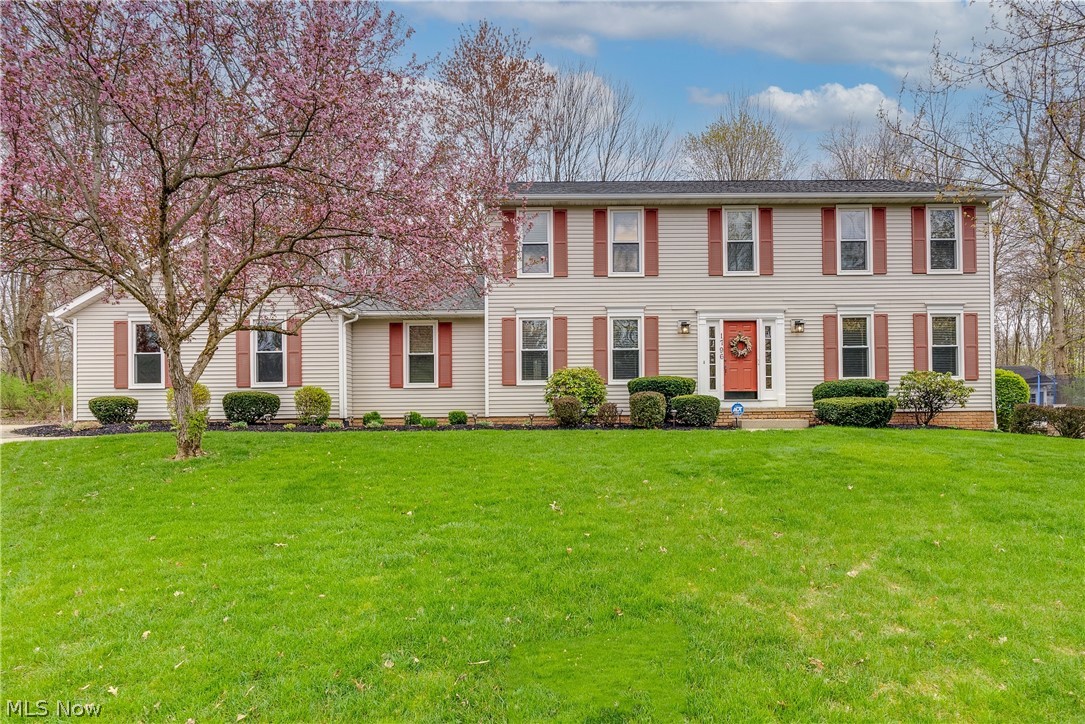 Welcome to your gorgeous 4 bedroom, 2.5 bath home in the area of Heather Hills in the heart of Stow!
You will not be disappointed when you enter the front door of this amazing and well-maintained home. To the left you will find your formal dining room and to the right you will find your formal family room. Past the foyer entrance is your extremely spacious eat-in kitchen, large enough for an additional dining table and with an open floor plan that leads into the living room and all of the natural light it provides with its oversized picture window. The eat-in area has double doors that open to the addition of the enclosed, all glass sunroom with sliding glass doors which take you to the massive composite deck, both perfect for entertaining.
The full, finished basement with its built in bar, has so many options…. space for a media/tv room, another space for an additional bedroom or office, and also, another large area for an additional living room/rec-room! The options are endless!