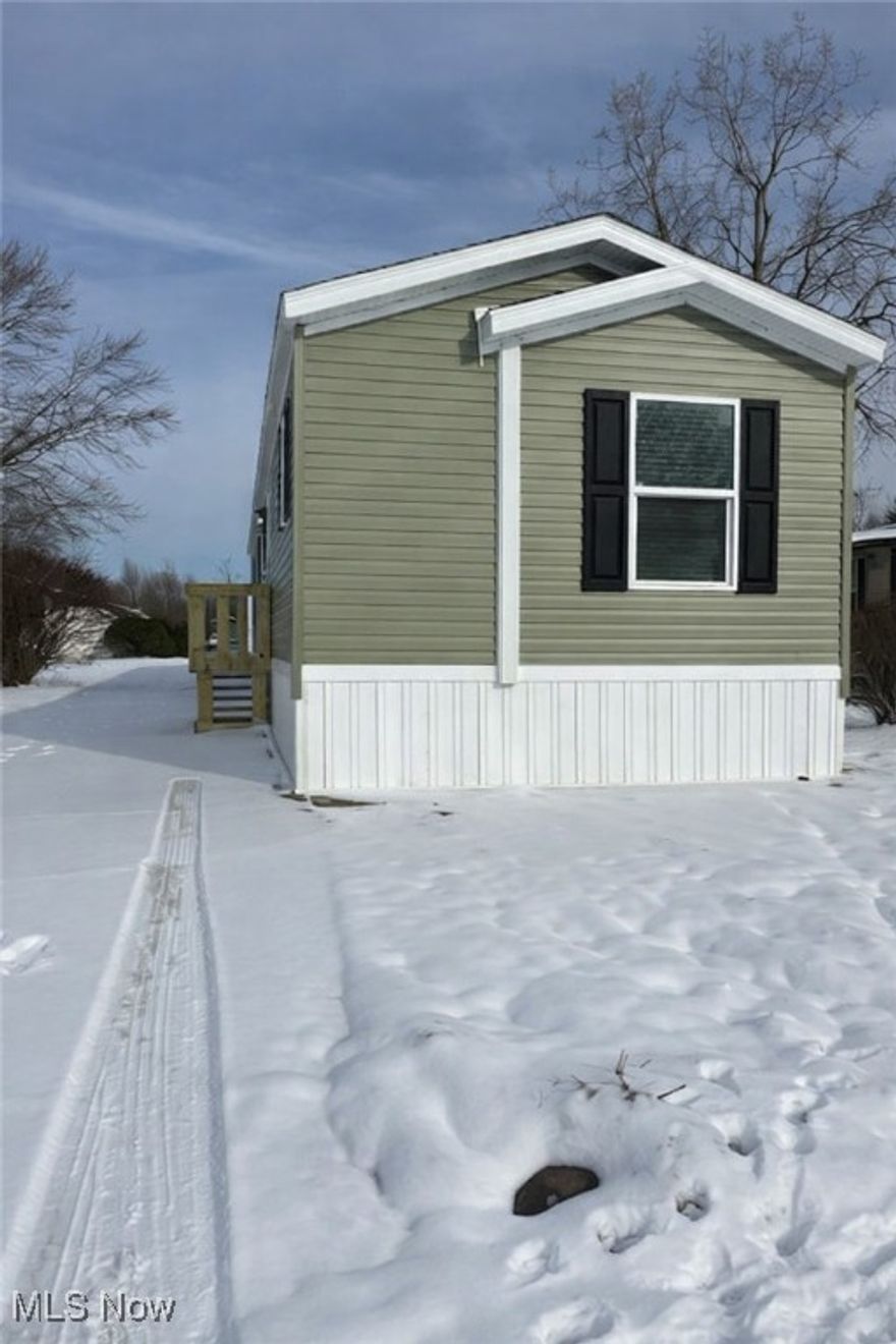 Brand new 2025 Clayton manufactured home featuring 2 bedrooms and 2 full baths. Open-concept layout with a modern kitchen, stainless steel appliances, center island, and stylish cabinetry. Primary suite offers a private bath and ample closet space. Additional highlights include central air, updated flooring, and neutral finishes throughout. Move-in ready and located in a well-maintained community.