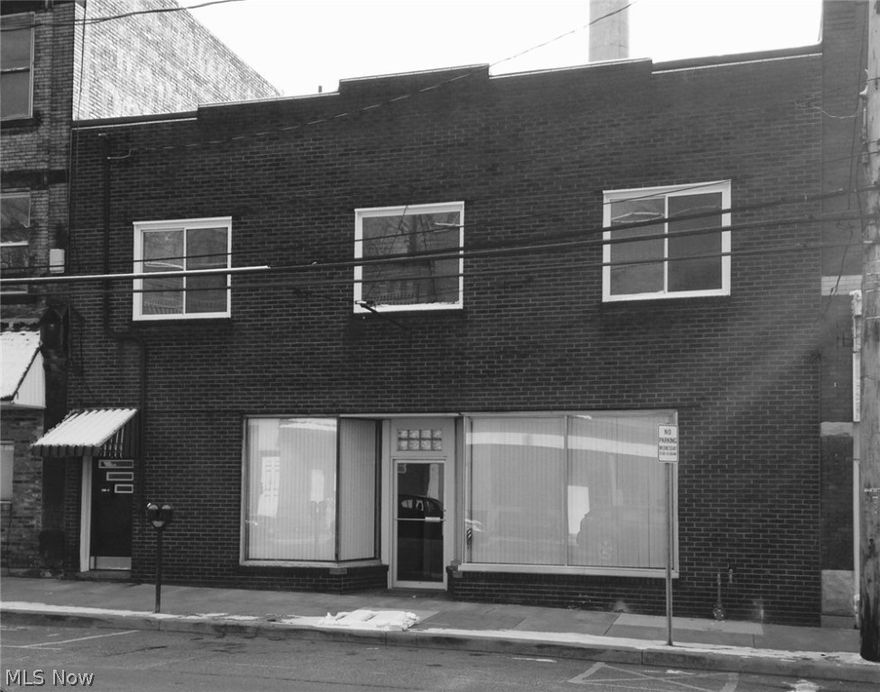 REAL ESTATE AUCTION - WEDNESDAY, SEPTEMBER 27, 2017 @ 5:00 PM! REAL ESTATE TERMS- $2,000. DEPOSIT DUE DAY OF AUCTION. BALANCE DUE WITHIN 30 DAYS. PROPERTY SELLS ABSOLUTE TO THE HIGHEST BIDDER! A two story brick building. First floor has been extensively remodeled into office area w/restroom. Second floor has 2 two-bedroom apartments, needs remodeled.