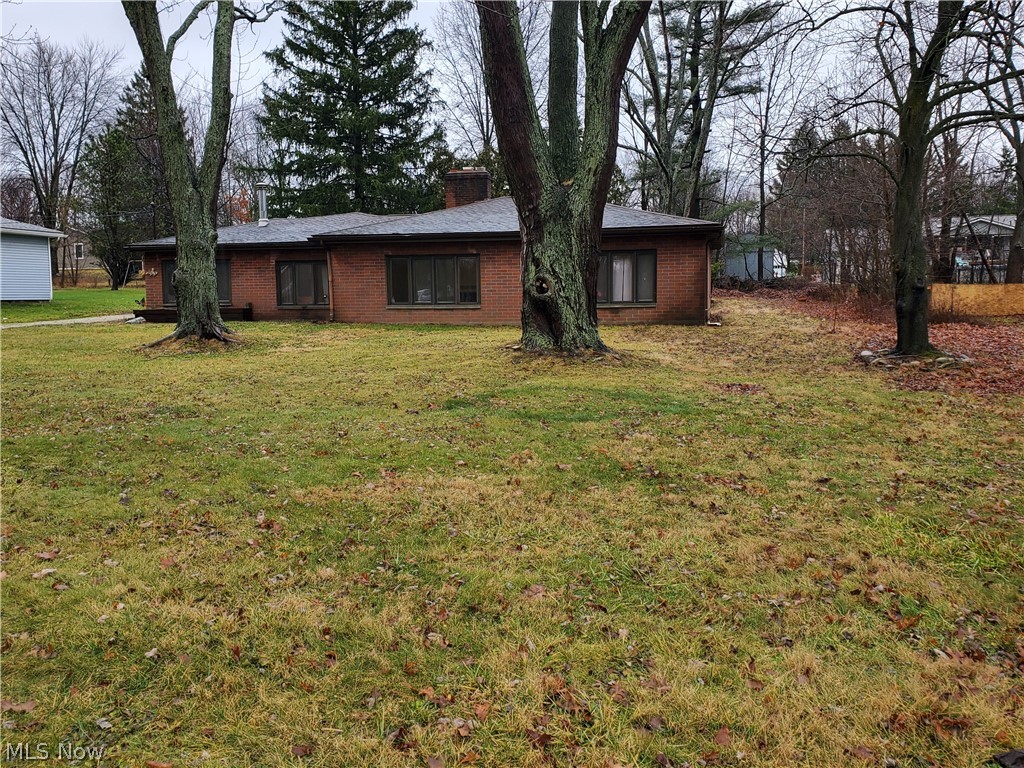 Looking for first floor living to make your own? Nice ranch features spacious rooms with lots of options for living space. Large living room features nice windows to allow an abundance of light AND enjoy the wood burning stove this winter. Huge eat in kitchen features updated quartzite counters (2021). The family room off the kitchen also features a wood burning fireplace plus there's a bonus room with sliders to the brick patio. If you love to entertain, there's space to spread out. Home is all brick and the attached 2 car garage is aluminum.