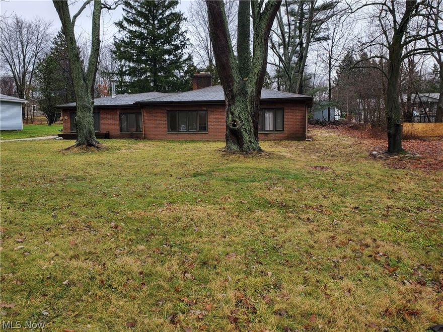 Looking for first floor living to make your own?  Nice ranch features spacious rooms with lots of options for living space.   Large living room features nice windows to allow an abundance of light AND enjoy the wood burning stove this winter. Huge eat in kitchen features updated quartzite counters (2021). The family room off the kitchen also features a wood burning fireplace plus there's a bonus room with sliders to the brick patio.  If you love to entertain, there's space to spread out.  Home is all brick and the attached 2 car garage is aluminum.