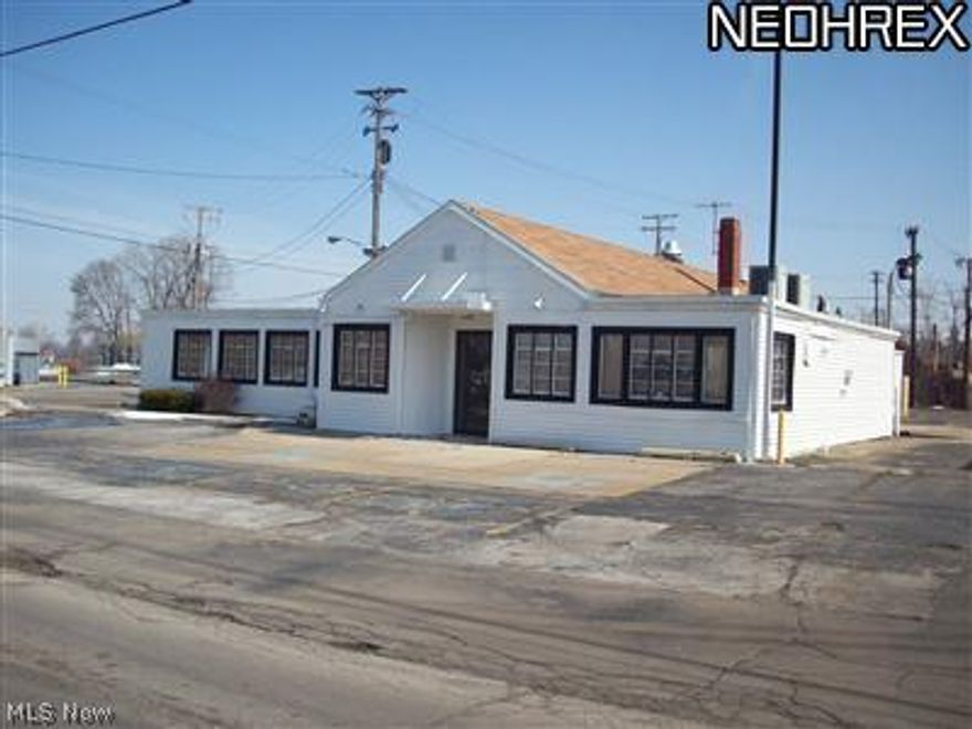 Location location location. Frontage on two streets with driveway access. 32 space off street private parking. Near medical offices, Walgreens, and downtown Ashtabula. High visibility from main streets. 4591 sq ft of commercial space. Some water damage to back of the building due to roof. Trane furnace and Ac unit in place. Has small room set up with a bar and public bathrooms. This is sold AS IS Possibilities are still endless...office space, restaurant or retail.