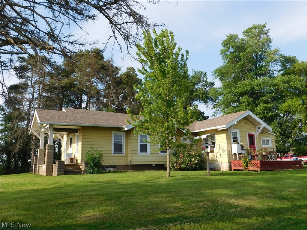 Looking for that affordable farmette to call your own? This 3 bedroom home comes with 15 acres ready to be molded into your desires. The home features a vintage kitchen, dining room, bathroom and sitting room. The acreage consists of tillable ground, small pond, 3 outbuildings, volleyball court, garden area, fruit trees and berry bushes.