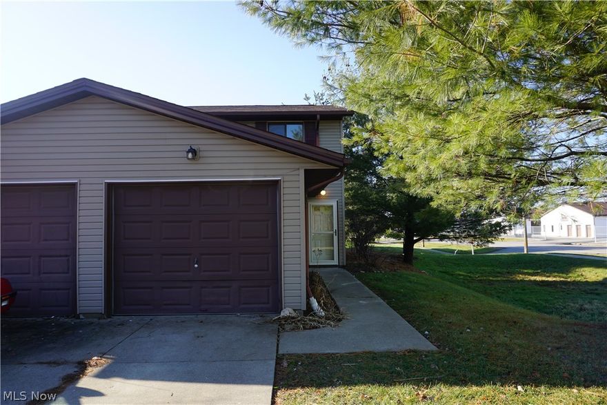 Lots of updates in this move-in ready two bedroom, one and a half bath townhouse!  Freshly painted, new upstairs carpeting, ceiling fans, front storm door and brand new hot water tank!  Kitchen features newly installed New Living Stone kitchen counters and all kitchen appliances stay!  For your convenience, the unit also features your own washer/dryer hook ups.  Attached is a 1.5 car garage that features additional ceiling storage space.  Relax on the back patio with privacy panels!  Come checked this unit out for yourself. Schedule your showing today!