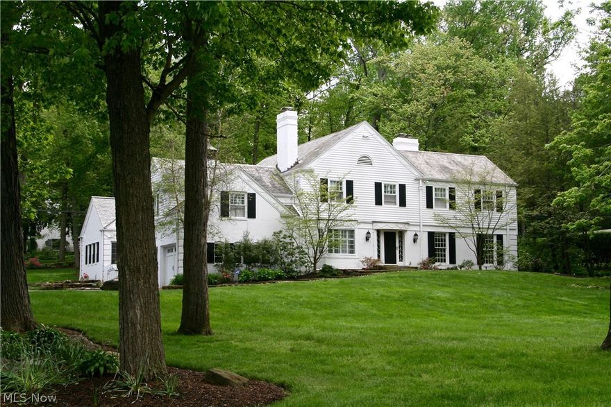 One of the finest homes in Fairlawn Heights!  Designed by Roy Firestone, this character-rich Colonial offers 4,449 square feet of gracious living space including 5 bedrooms and 4.2 baths.   Meticulously restored and updated. Highlights include slate roof, gorgeous hardwood floors, many custom built-ins and 4 fireplaces.  A 2001 addition created a spacious gourmet kitchen open to fabulous vaulted family room and patio!  Formal Living Room and Dining Room. Lovely screened porch accessible from Living Room and front hall. First floor study/library with gas fireplace. Master includes walk-in closet and updated Bath. Bedrooms 2 and 3 share hall bath. Bedroom 4 with en-suite bath. Fantastic Bonus Room over garage (currently 5th bedroom) has radiant heated floors. Front and back staircases. Tank-less hot water heater. First floor and lower-level laundry rooms. Beautifully landscaped grounds with barn stone walls include outdoor stone fireplace/patio and charming pergola-covered courtyard. Gen