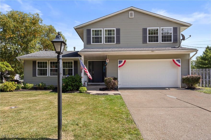 Welcome to this beautiful 4-bedroom, two and a half bath, Colonial-style home in the heart of Vermilion! From the moment you arrive, you’ll be impressed by the stunning curb appeal, professionally landscaped exterior, and inviting foyer entryway. Inside, you’ll find hardwood floors throughout and a spacious layout that includes both a living room and family room on the first floor—perfect for entertaining or relaxing.
The large dining room flows seamlessly into the updated kitchen, featuring custom oak cabinets, a breakfast bar with extra storage, and newer French doors that open to a concrete patio overlooking the privacy-fenced backyard.
Upstairs, you’ll love the master bedroom retreat, complete with a remodeled en suite master bath. The home also features a remodeled guest bathroom upstairs and a beautifully updated powder room on the first floor.
Additional highlights include central air conditioning, a waterproofed basement, and a home warranty for peace of mind. Major updates provide lasting value, including newer vinyl siding, roof, and gutters (2012) along with updated double-hung windows in the front.
This home is situated in a wonderful neighborhood with curbs, sidewalks, and lighted streets, and is just a short walk to the community pool and schools. You’ll also enjoy being close to Downtown Vermilion, local beaches, shopping, and marinas—everything you need for small-town charm and Lake Erie living!