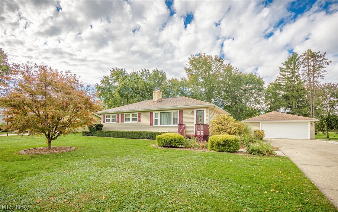Beautiful ranch maintained in excellent condition. Impressive curb appeal with mature landscaping and a lush green lawn and park like backyard. A double wide concrete driveway leads to a 2 car garage plus there is a deck porch , a covered patio , two sheds and a nice large fenced area for pets. Formal living room with wood burning fireplace and heat Insert for extra warmth. The gorgeous kitchen/dining area were recently remodeled with new white cabinets. granite counters, tile backsplash, new stainless appliances, sink, fixtures and luxury vinyl floor plus a slider to the back patio. Three bedrooms and a full bath complete the first floor. Nice lower level rec room with a bar and a nature stone floor. a kitchenette, laundry room, and a full bath! Home warranty included. Close to Hudson Dr and convenient to the highway.