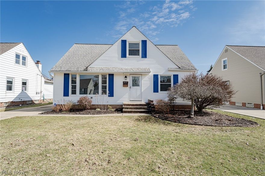 Nice! Move right into this extensively renovated cape cod in Mayfield Heights! This charming home features over 2500 square feet of living space with features including spacious living areas, updated flooring throughout, a beautiful eat-in kitchen, and fresh neutral paint throughout! The front door opens into a nice foyer that flows into the living room. The living room features a lovely picture window and newer vinyl flooring that flows throughout the first floor living areas. The eat-in kitchen boasts stainless steel appliances, granite countertops, a glass tile backsplash, and a breakfast bar. The kitchen is open to the dining room that connects to a very spacious family room with a wood-burning fireplace! There are two bedrooms with fresh carpet off of the living room, as well as beautifully redone full bath with a ceramic tile shower surround and natural wood accents. Upstairs, there is a very large third bedroom with built-ins, newer flooring, and an ensuite half bath. The lower