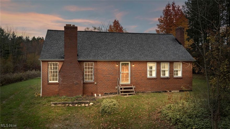 Exceptional opportunity awaits with nearly 5 acres of picturesque land in beautiful Aurora! This property features a home that was in the process of renovation, offering the ideal chance to complete it to your personal vision. The upper level includes three well-sized bedrooms, ample closet space, and a full bathroom. On the main floor, enjoy a cozy living room with a fireplace, a dining room, kitchen, and an additional full bathroom. The original attached garage was being transformed into a spacious great room, complete with a second fireplace. Outdoors, a large, barn-style three-car garage with a generous loft area adds versatile storage or workspace. As an added bonus, the adjacent parcel is also available, giving you the rare potential to expand your estate to over 10 private acres.