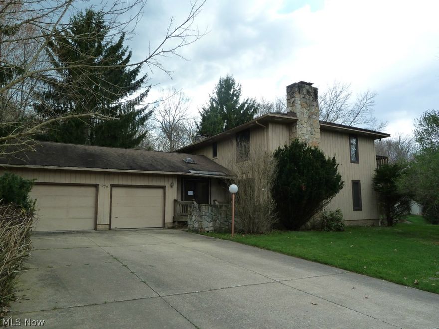 Great potential!  Four Bedrooms, 3 1/2 baths with 3 car garage and 4 Fireplaces. Located on a lovely street this property is waiting for a new owner to restore.  In ground pool and beautiful wooded lot.  Call today for your private showing.  Buyer and Buyer's agent to verify all information. Brokers read remarks